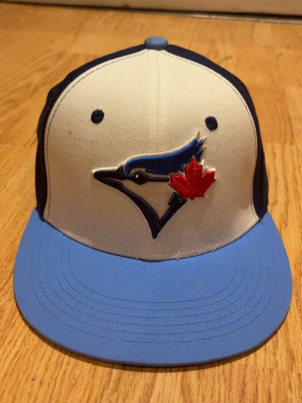 Two-Tone Cream and Light Blue Baseball Snapback Hat with Team Embroidered Logo